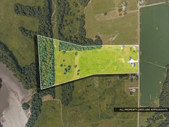 Aerial with approximate property lines — 29 acres running back to the tree line