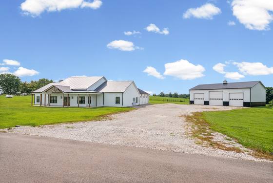 Main home, second home and shop from the drive