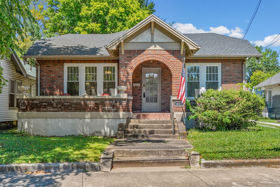 Front elevation — 1935 brick bungalow with an arched covered porch