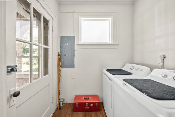 Laundry room with side-door access
