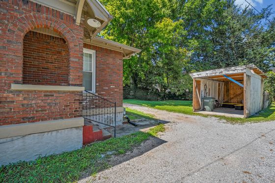 Side yard and drive to the detached garage