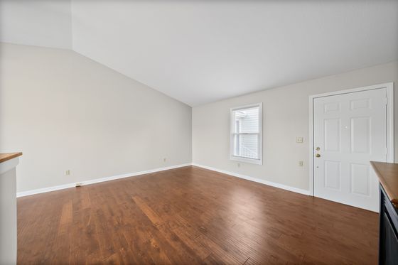 Living room looking toward the front entry door