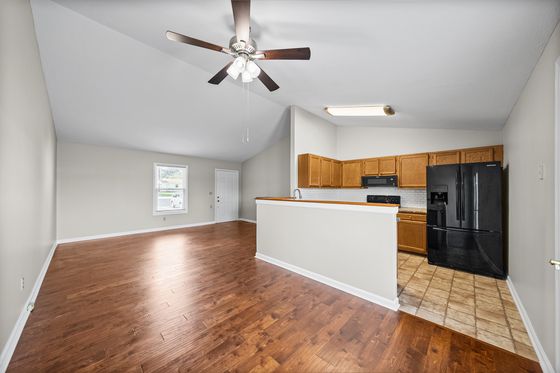 Open floor plan looking from the living room into the kitchen