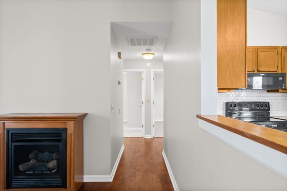 Kitchen counter with the hallway to the bedrooms beyond