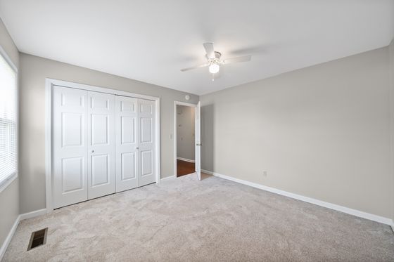 Second bedroom with closet and doorway to the hall