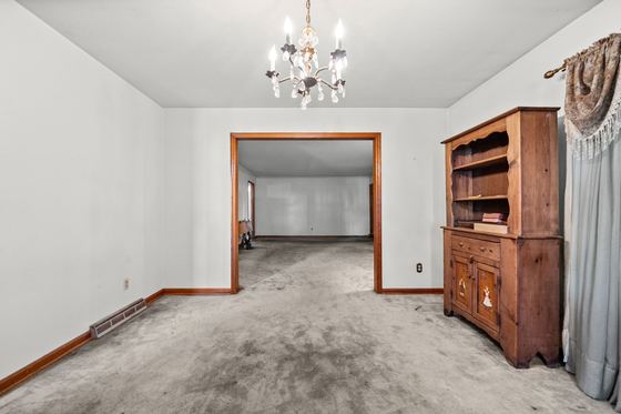Dining room, looking through toward the den, 5525 Glass Lane