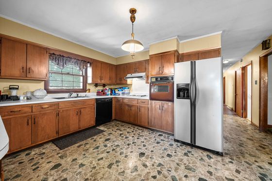 Kitchen, refrigerator and the window over the sink, 5525 Glass Lane